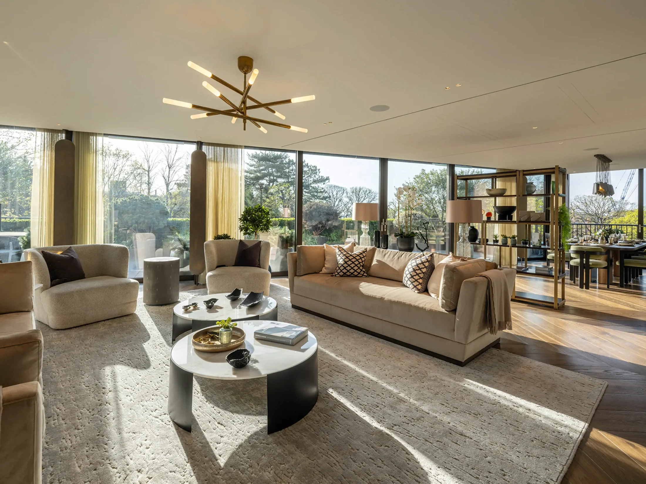 Buxmead apartment living room with contemporary art and garden views