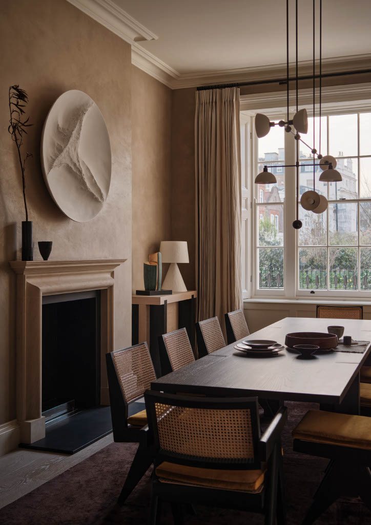 Belgravia townhouse study with curated artworks and furniture